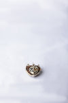 Authentic 1 Mukhi Rudraksha bead with a single natural cleft representing Lord Shiva. The bead is dark brown with a highly textured, seed-like exterior and a natural hole for threading