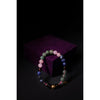Multicolored beaded bracelet on a dark background