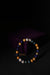 Depression Healing Bracelet featuring smooth, round beads of purple Amethyst, lilac Lepidolite, and deep black Tourmaline, arranged in a calming sequence on an elastic cord