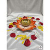 Traditional Indian brass oil lamp in a blooming flower design featuring glossy orange petals and a polished metallic center