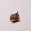 A genuine Gauri Shankar Rudraksha bead, showing two naturally fused Rudraksha seeds forming a symmetrical twin shape with deep, clear grooves and natural brown texture