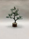 Handmade MahaShubh Money Magnet Tree placed on a wooden desk to enhance office Vastu and financial growth