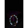 Beaded bracelet with multicolored beads on a dark background