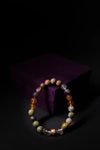 Multicolored beaded bracelet on a dark background