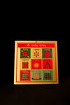 A colorful booklet with a diagram for each planet in astrology, titled 'Shri Navgrah Yantra' in a vibrant font on a dark background.