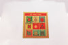 Gold-plated Shri Navgrah Yantra with nine planetary numerical grids and Sanskrit mantras.