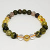 Multicolored beaded bracelet on a white background