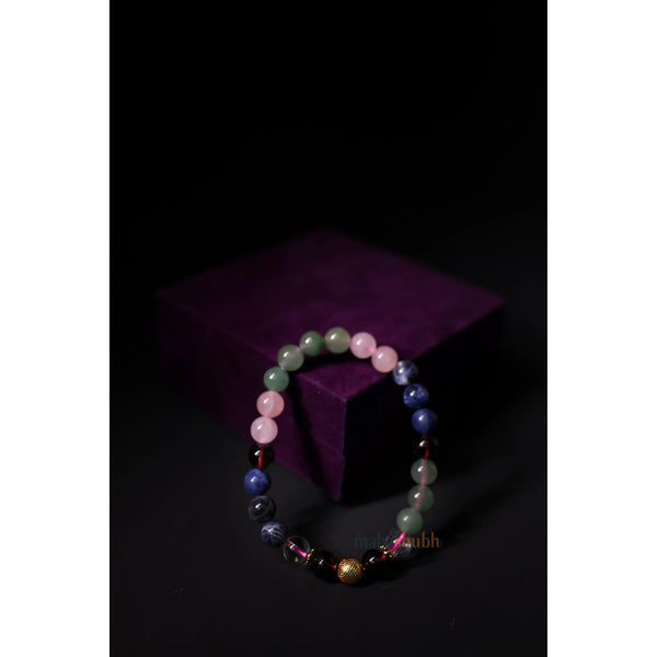 Multicolored beaded bracelet on a dark background