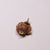 A genuine Gauri Shankar Rudraksha bead, showing two naturally fused Rudraksha seeds forming a symmetrical twin shape with deep, clear grooves and natural brown texture