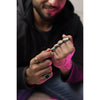 Person holding a rosary with close-up of hands and beads