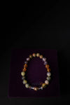 Multicolored beaded bracelet on a dark background