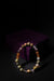 Multicolored beaded bracelet on a dark background