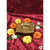 Handcrafted square brass oil lamp with a high-shine gold finish, ideal for traditional pooja and home lighting