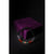 Beaded bracelet on a purple velvet box against a black background