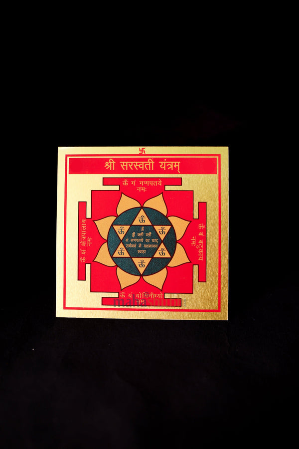 Gold-plated-Shri-Saraswati-Yantra-on-wooden-stand-with-etched-mantras